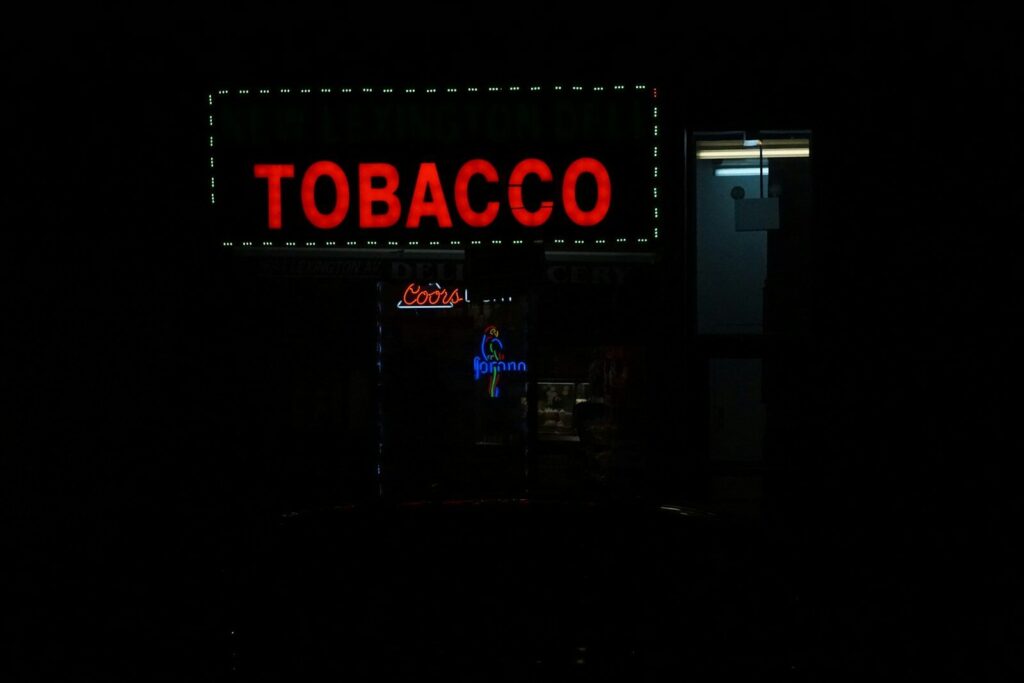red and black Tobacco LED signage